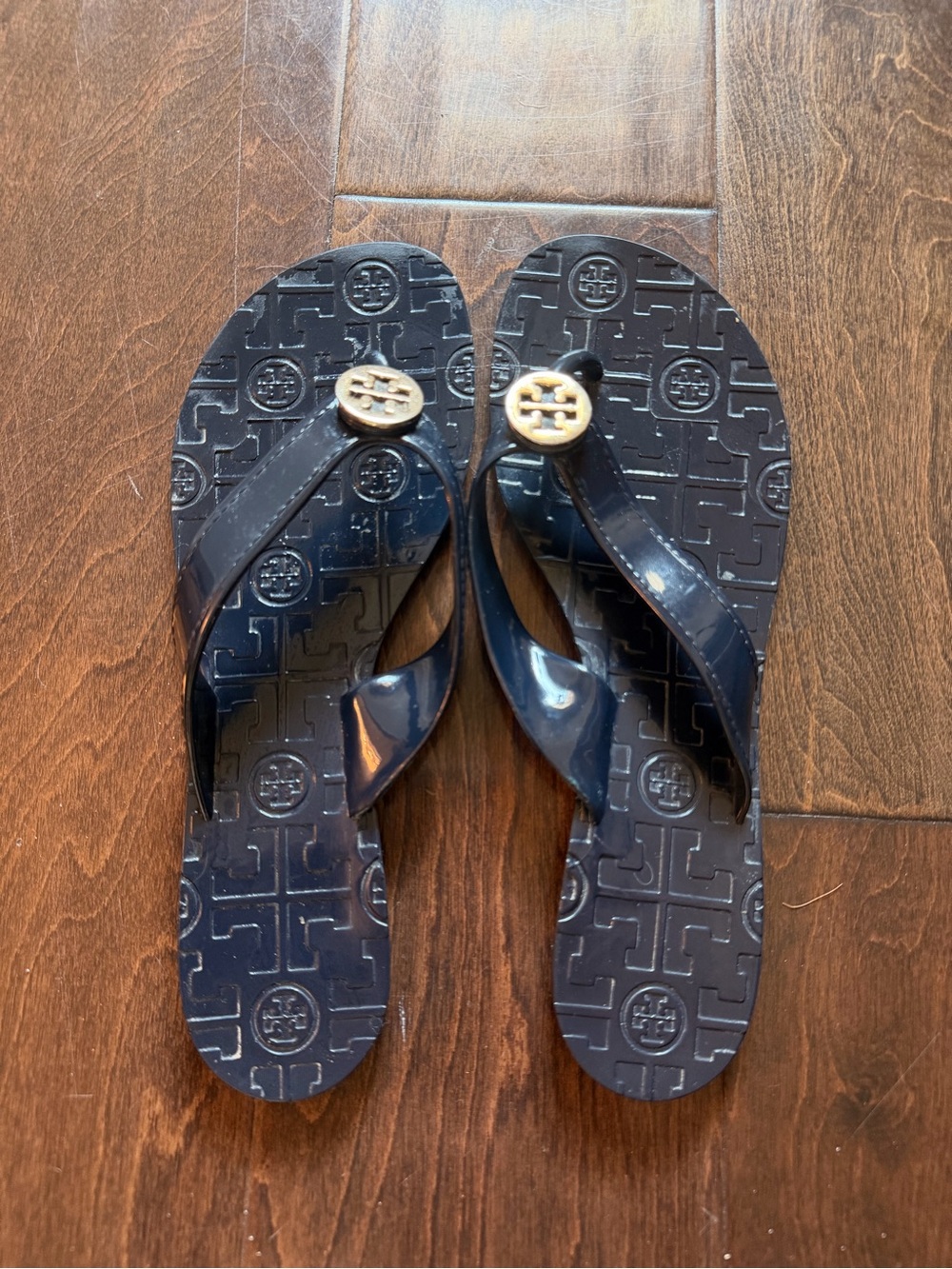 Tory Burch Navy Logo Jelly Flip Sandals with Gold Emblem